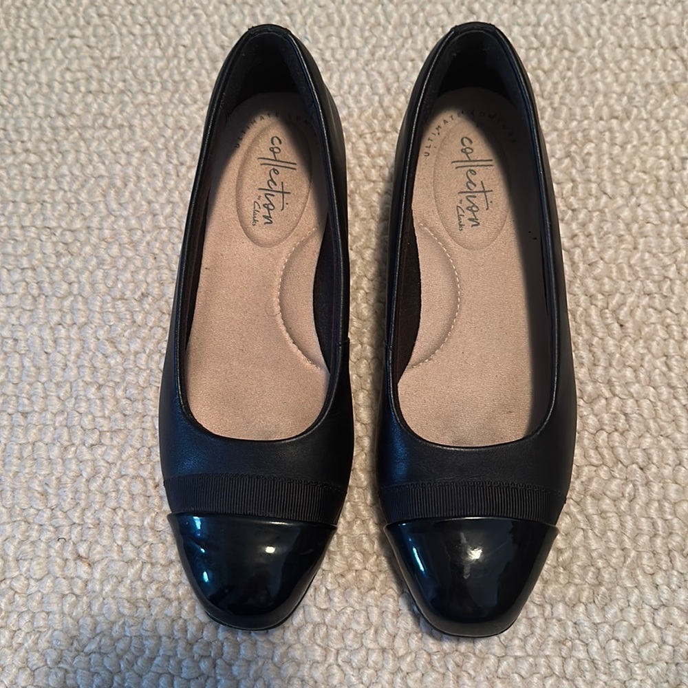 Black almost brand new . Worn once with 1/2 inch heal . Very comfortable.